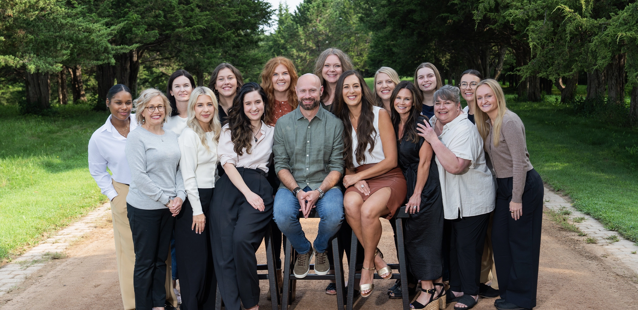 The Minneapolis dental team at Holger Dental Group smiling outdoors